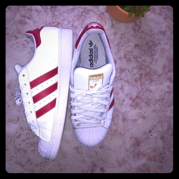 red and white adidas shell toes